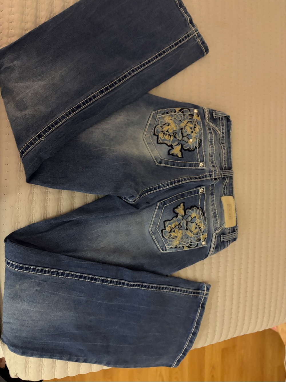 Angel Women's Blue Bootcut Jeans with Floral Embroidered Pockets